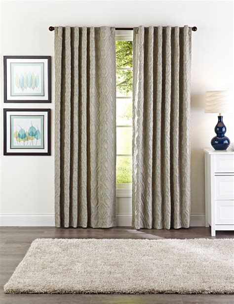 The heavy fabric of black out curtains falls softly and evenly to the floor and they make a big impression on the style of your room, too. . Living room blackout curtains